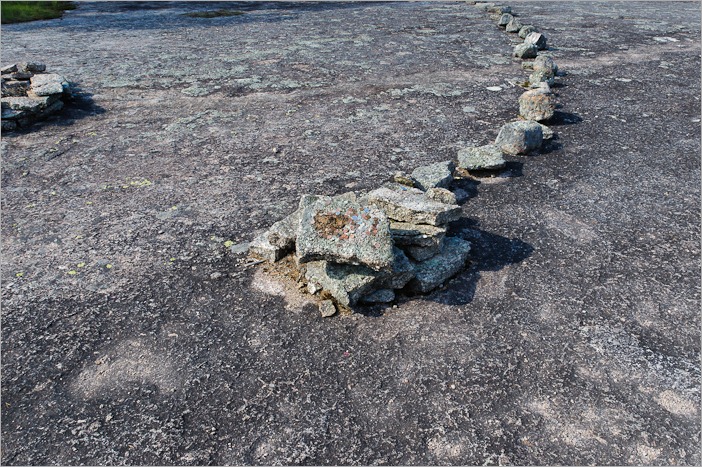 Offerings at an entrance into the circle of stones Offerings at an entrance into the circle of stones